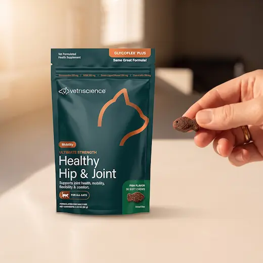 A soft chew being taken from the pouch